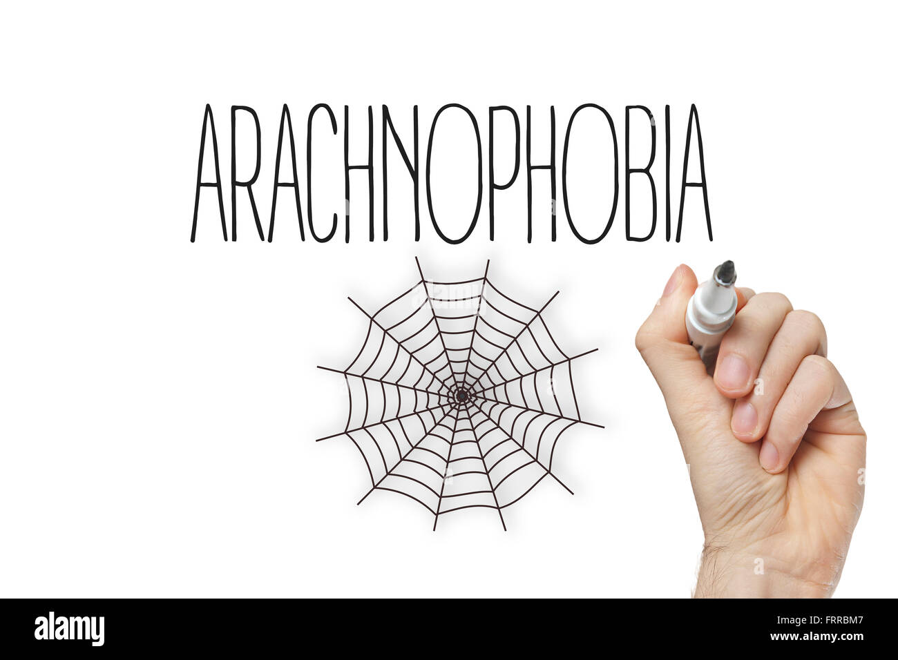 Hand writing arachnophobia on a white board Stock Photo