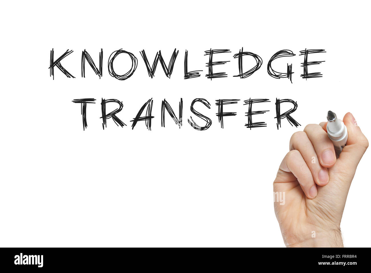 Hand writing knowledge transfer on a white board Stock Photo