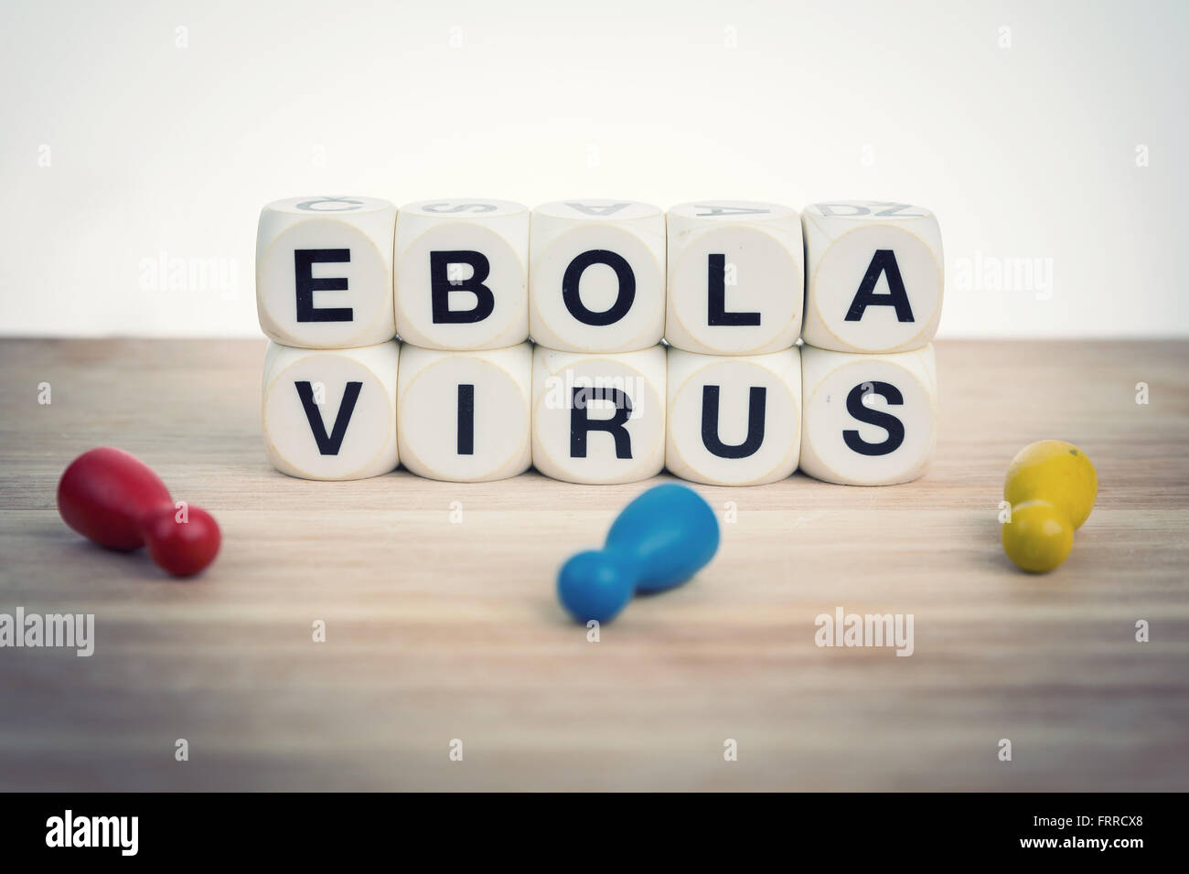 Ebola Virus concept with dead pawns near term spelled out Stock Photo