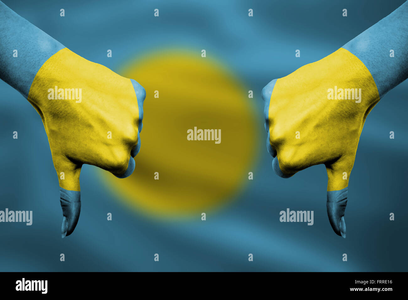 failure of Palau - hands gesturing thumbs down in front of flag Stock ...