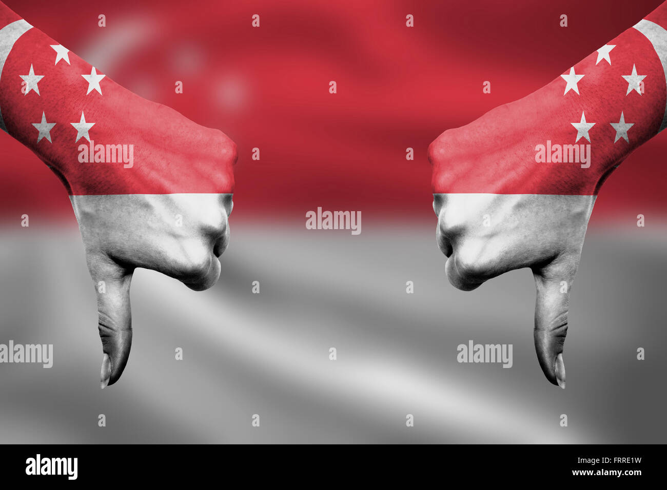 failure of Singapore - hands gesturing thumbs down in front of flag ...