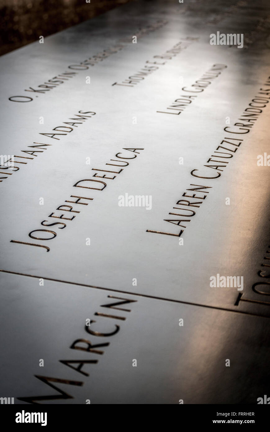 Names of victims engraved on 9/11 memorial, New York, USA Stock Photo