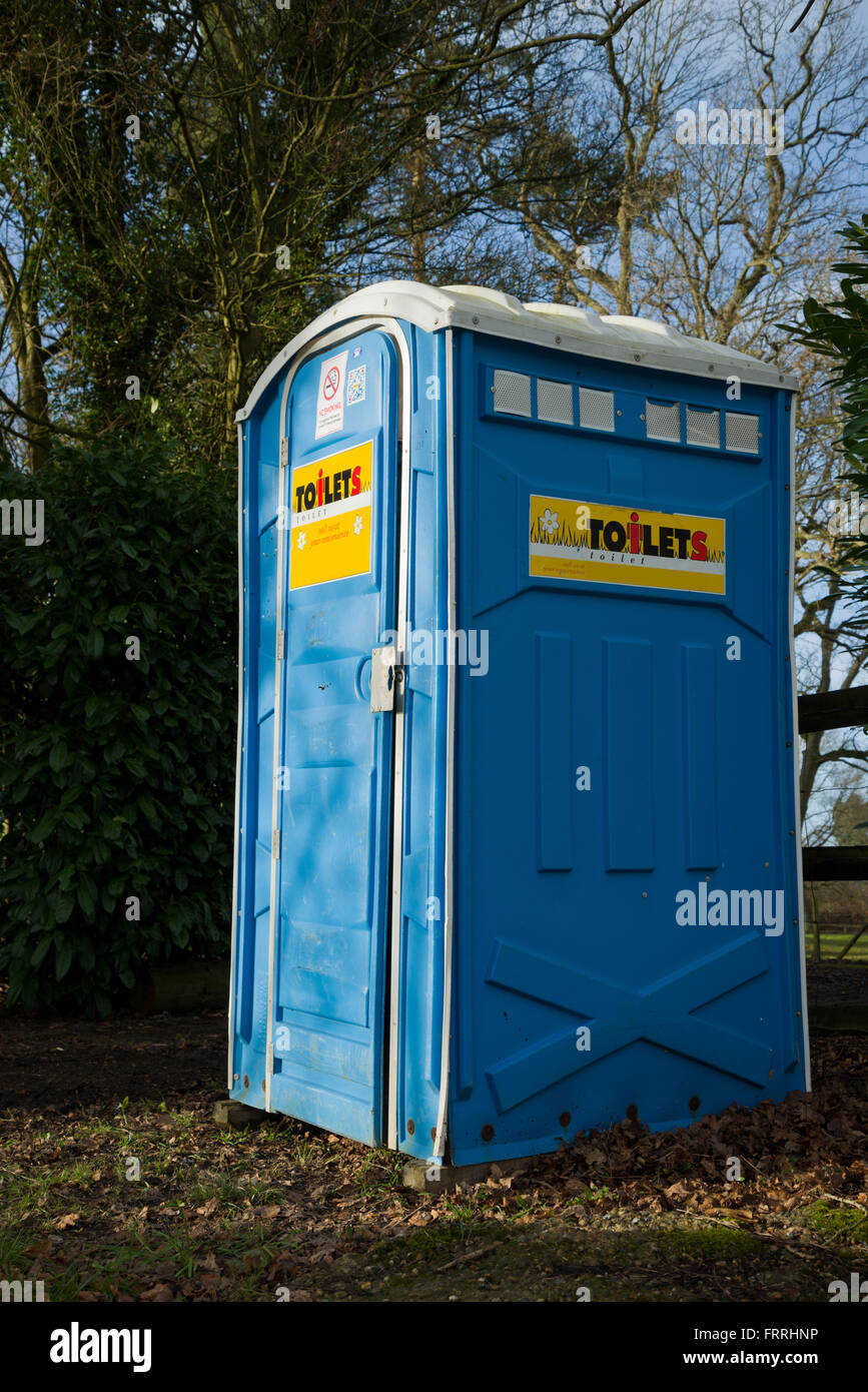 Building site toilet. Site lavatory for workmen. Legal requirement to provide a toilet for workforce. Stock Photo