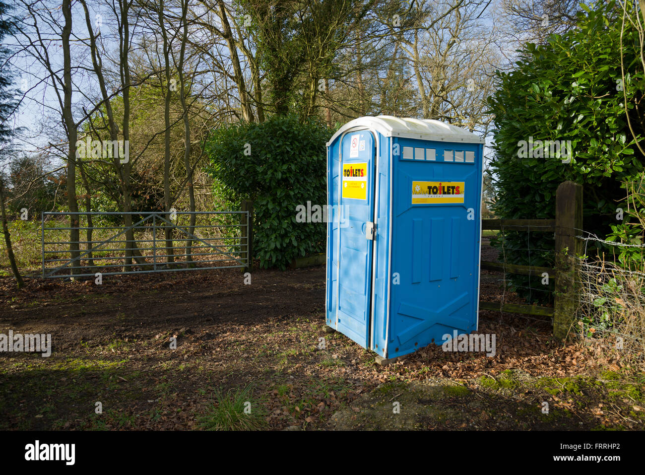 Building site toilet. Site lavatory for workmen. Legal requirement to provide a toilet for workforce. Stock Photo