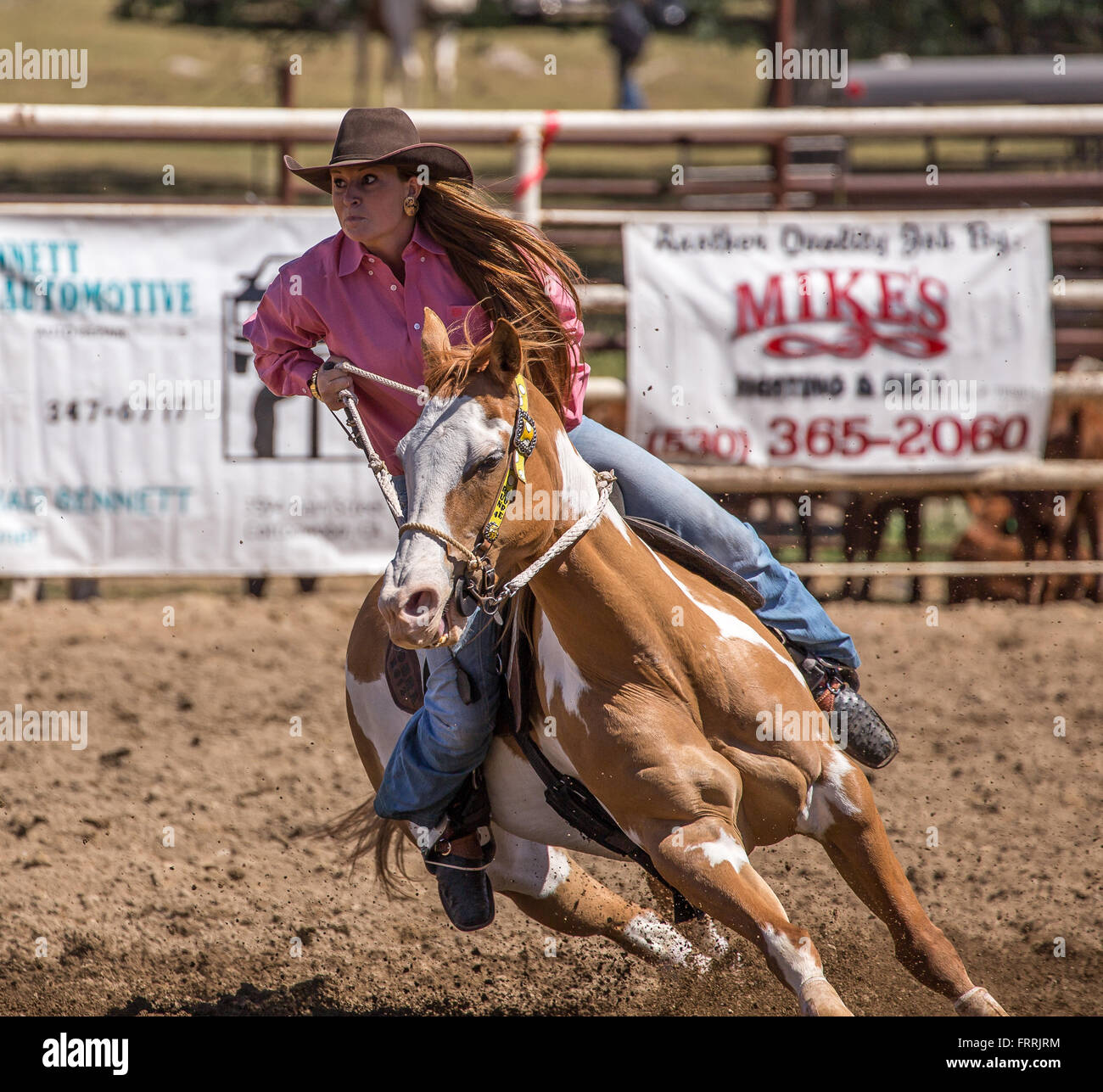 Barrel racerin action at the Cottonwood, California Rodeo Stock Photo ...