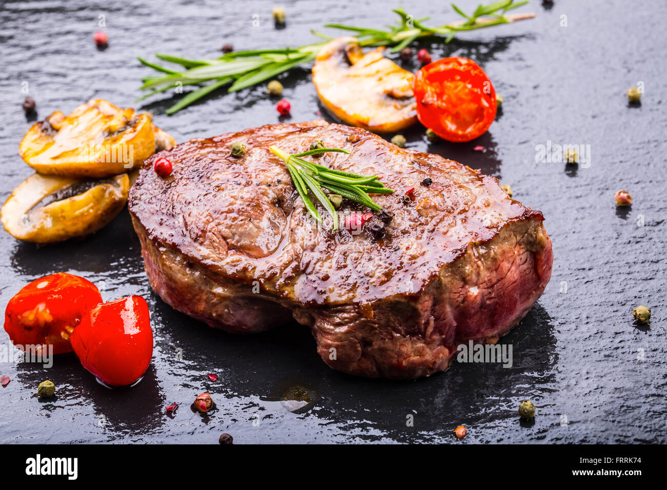 Steak. Grill beef steak. Portions thick beef juicy sirloin steaks on grill teflon pan or granite