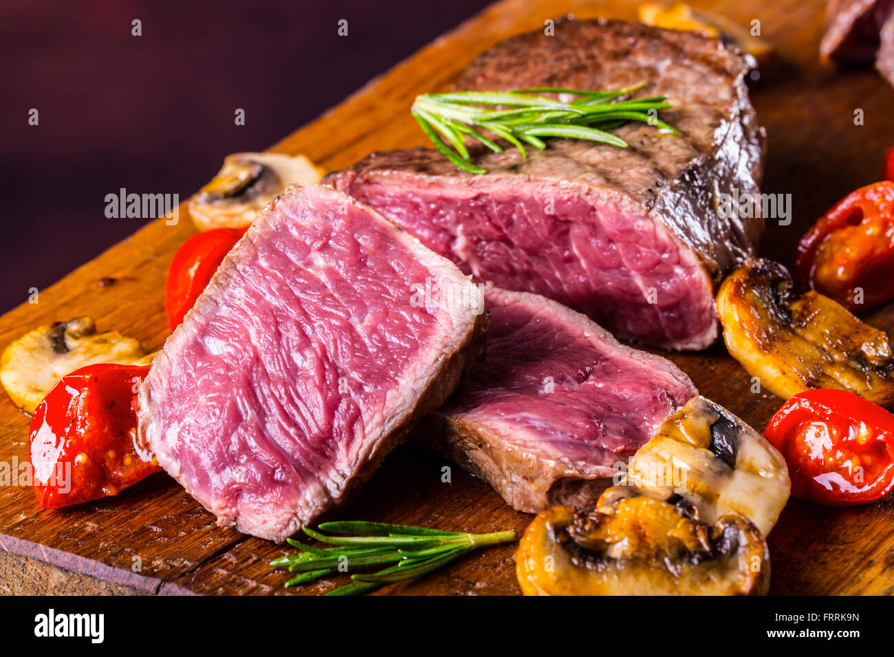 Steak. Grill beef steak. Portions thick beef juicy sirloin steaks on grill teflon pan or granite