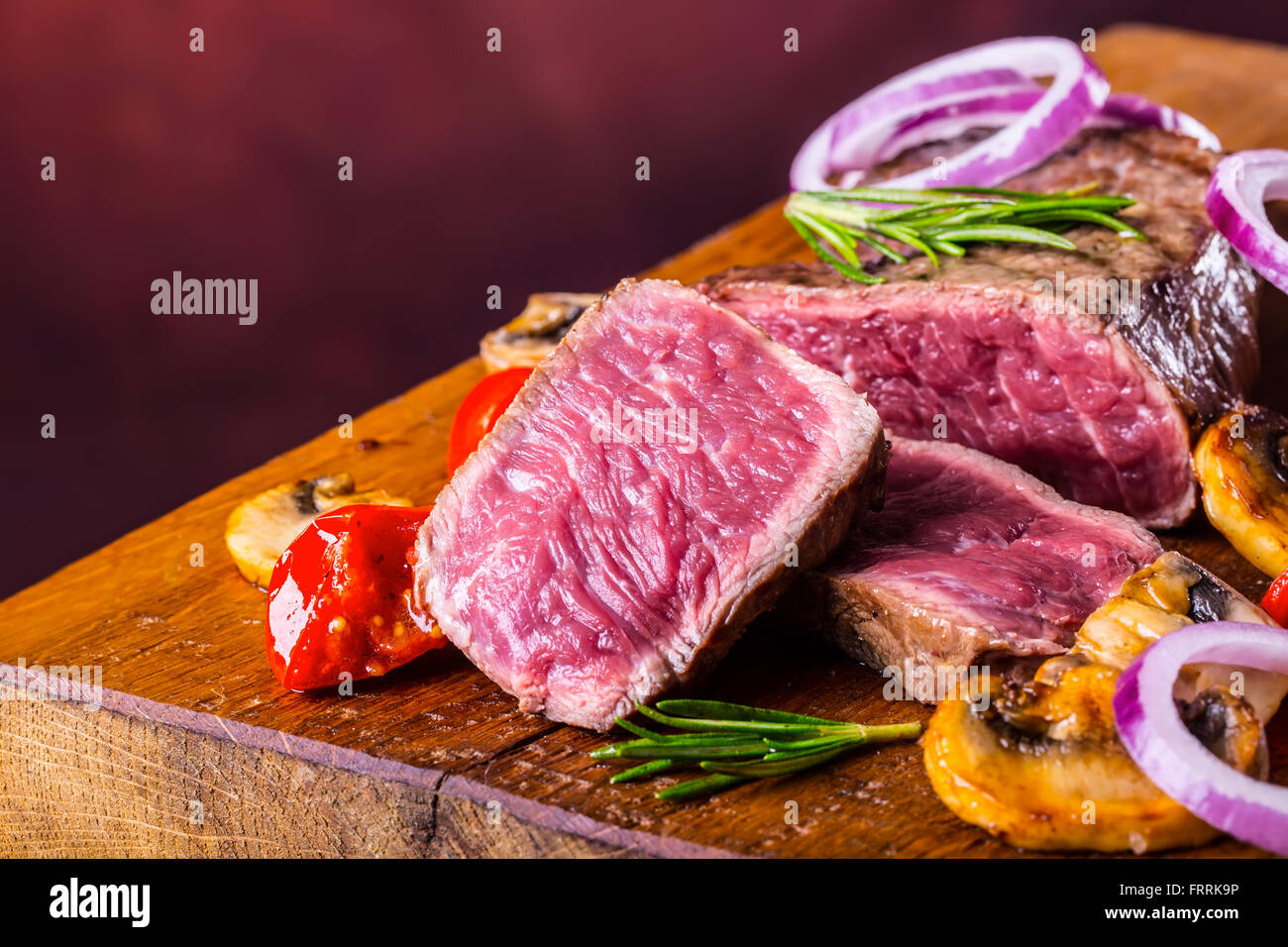 Steak. Grill beef steak. Portions thick beef juicy sirloin steaks on grill teflon pan or granite