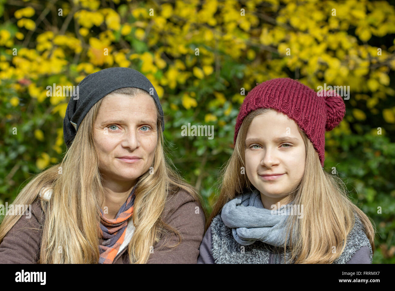 Mother and daughter on a sunny autumn Stock Photo