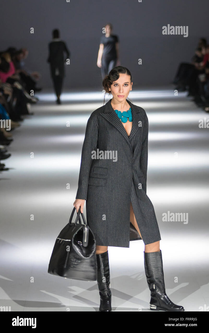 A model, bag detail, walks the runway during the METROCITY show at News  Photo - Getty Images