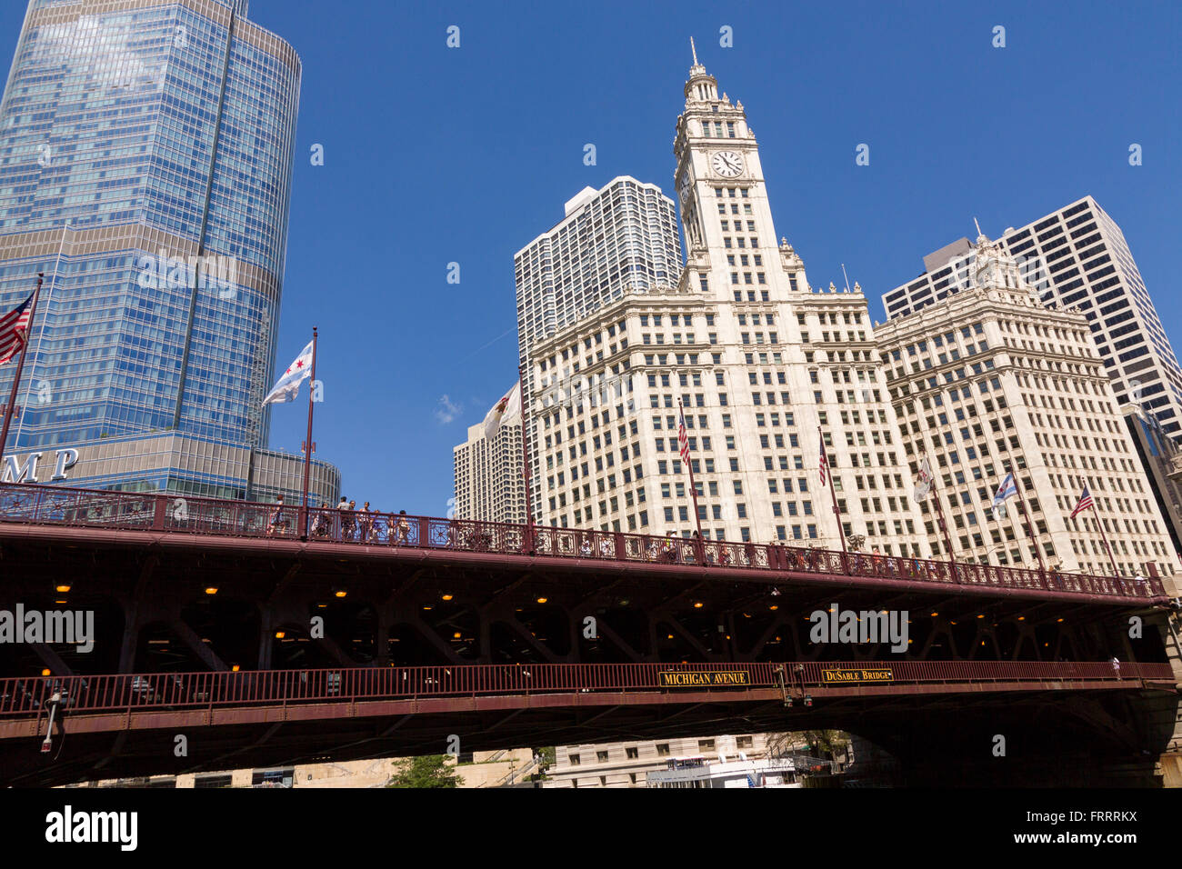 Wrigley Building and Trump Tower with the DuSable Bridge viewed from Riverwalk on a summers day in Chicago, Illinois, USA Stock Photo