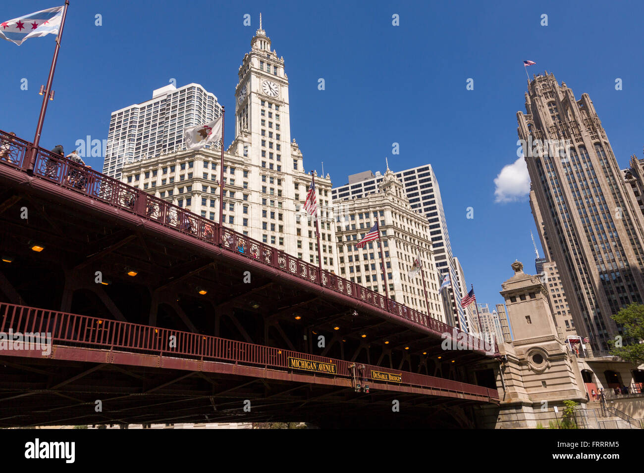 Wrigley Building and Tribune Tower with the DuSable Bridge viewed from Riverwalk on a summers day in Chicago, Illinois, USA Stock Photo