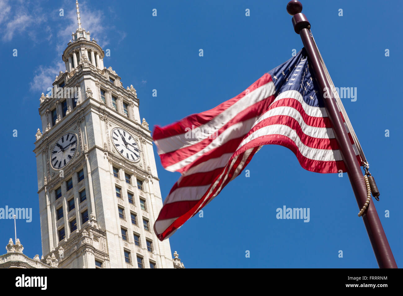 American flag and Wrigley Building on a summers day on Michigan Ave in Chicago, Illinois, USA Stock Photo
