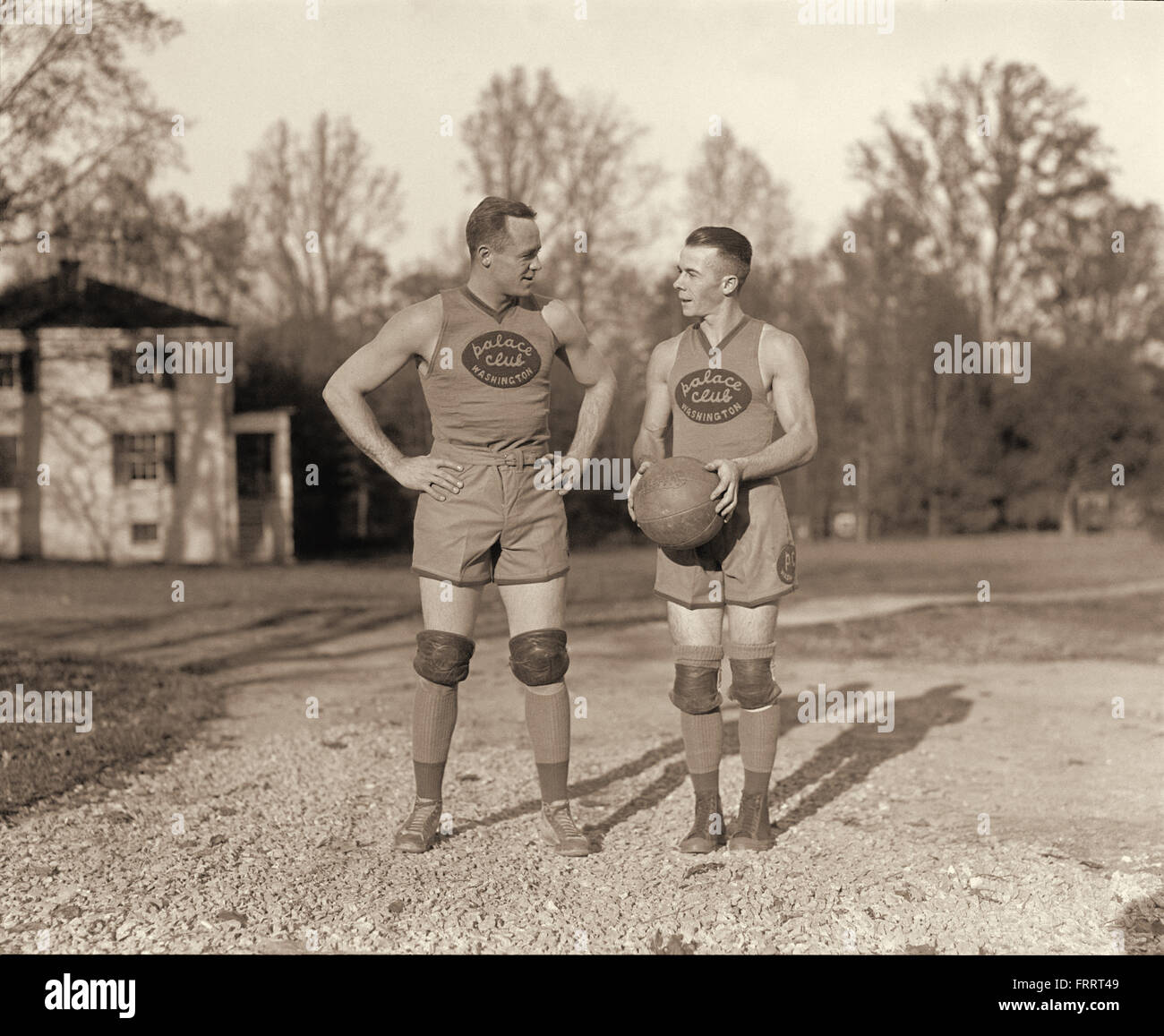 Bob Grody and manager Ray Kennedy of the Palace Club basketball team, a Washington, D.C., franchise of the American Professional Basketball League, which was sponsored by the Palace Laundry.  Photo: 1925. Stock Photo