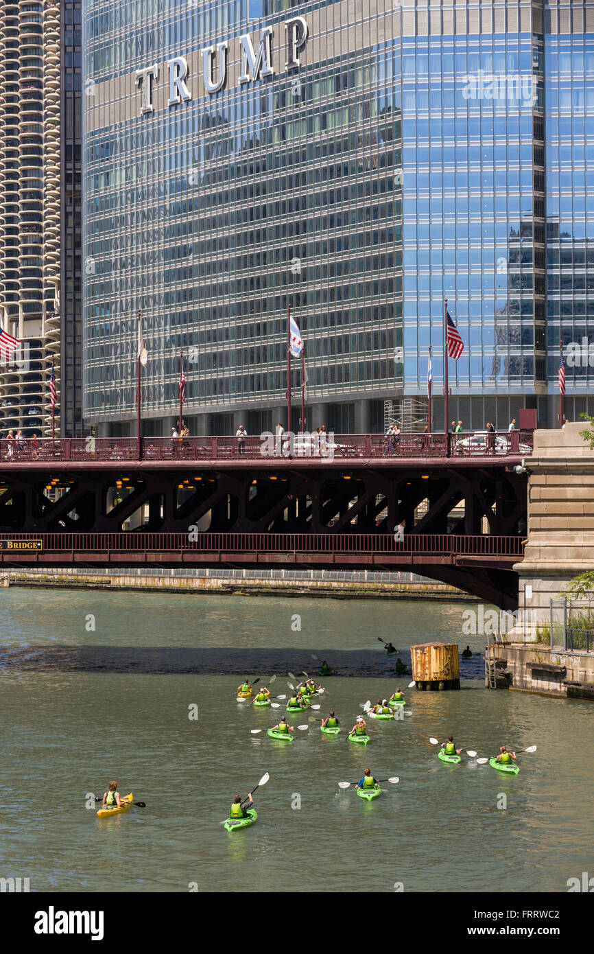 Kayakers on the Chicago River with the DuSable Bridge and Trump Tower on a summers day in Chicago, Illinois, USA Stock Photo