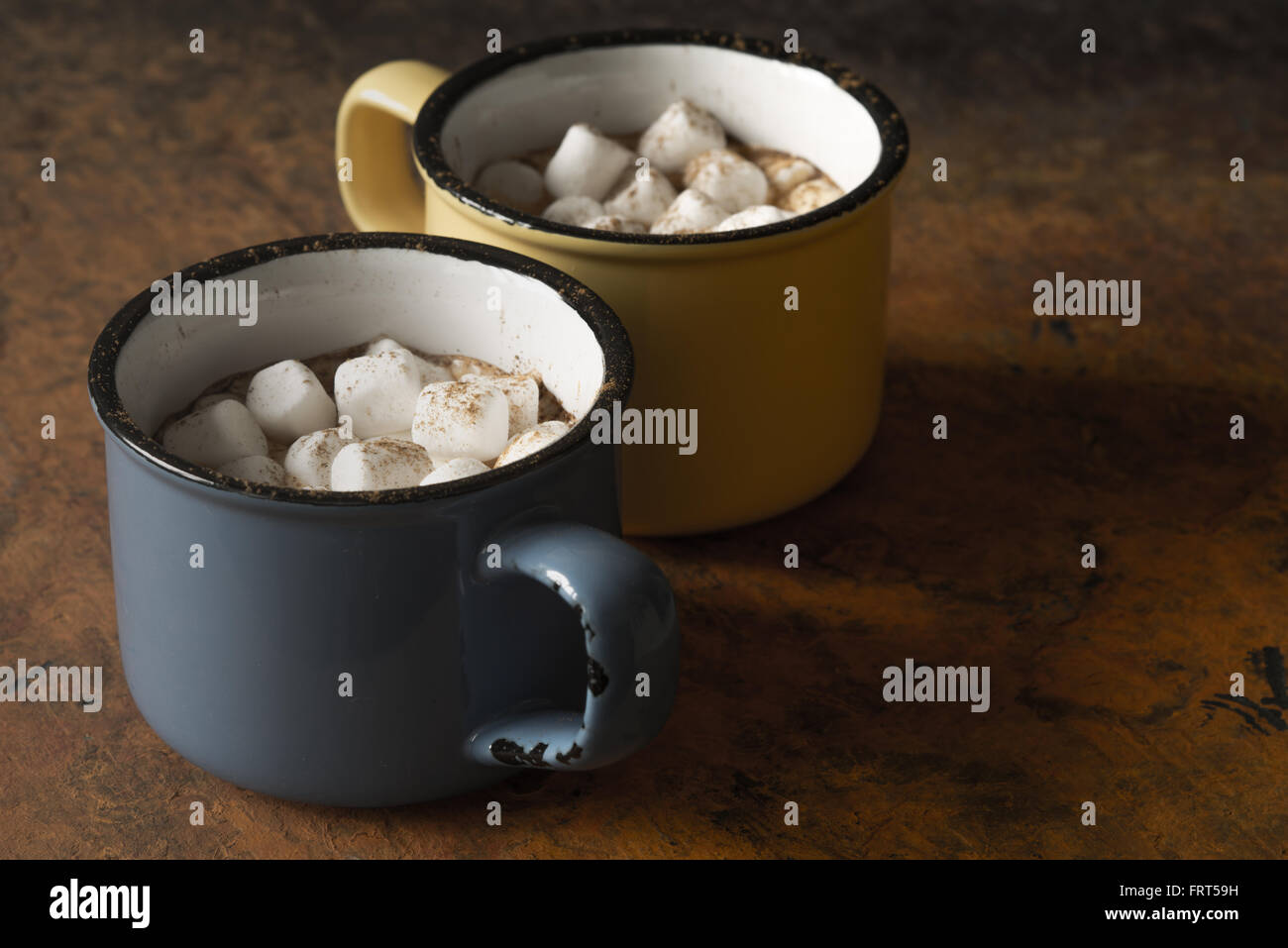 Cups of cocoa with marshmallows on the stone table horizontal Stock Photo