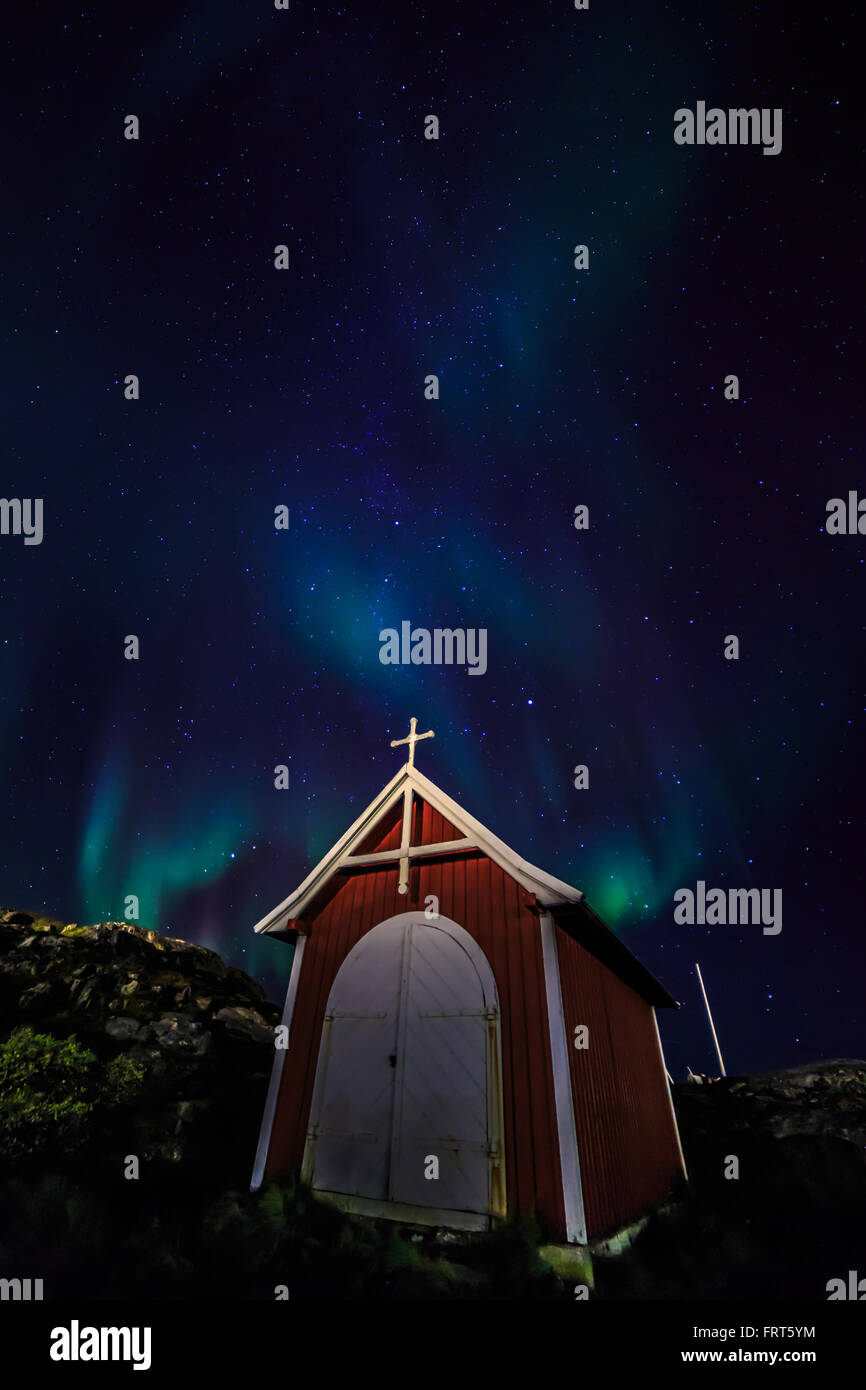 Aurora Borealis phenomenon, Northern lights over the small chapel, Nuuk city center, Greenland, October 2015 Stock Photo
