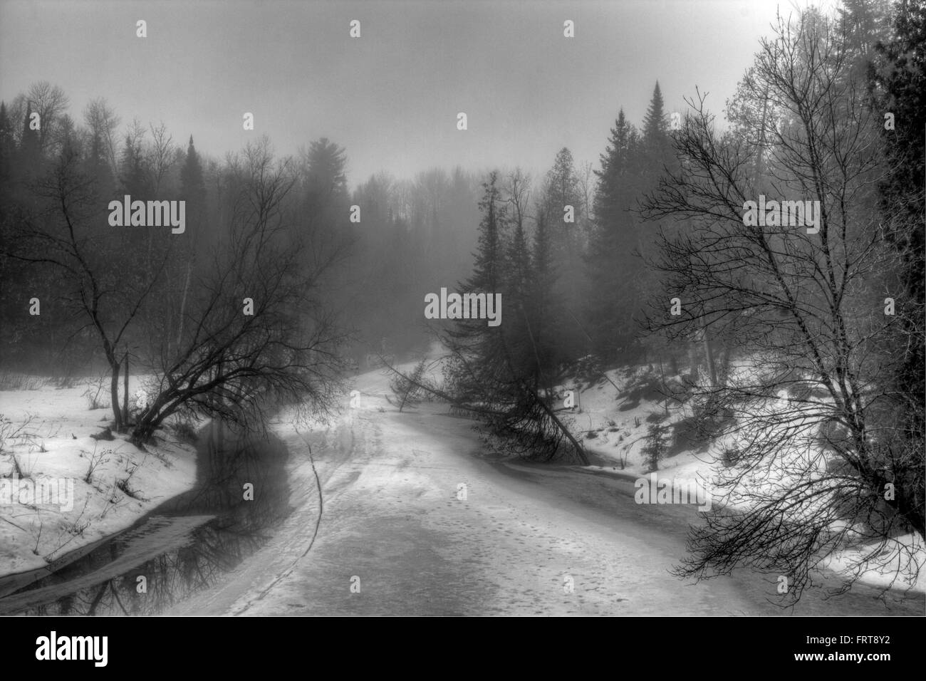 River of slush, spring melt. Black and white image. Stock Photo
