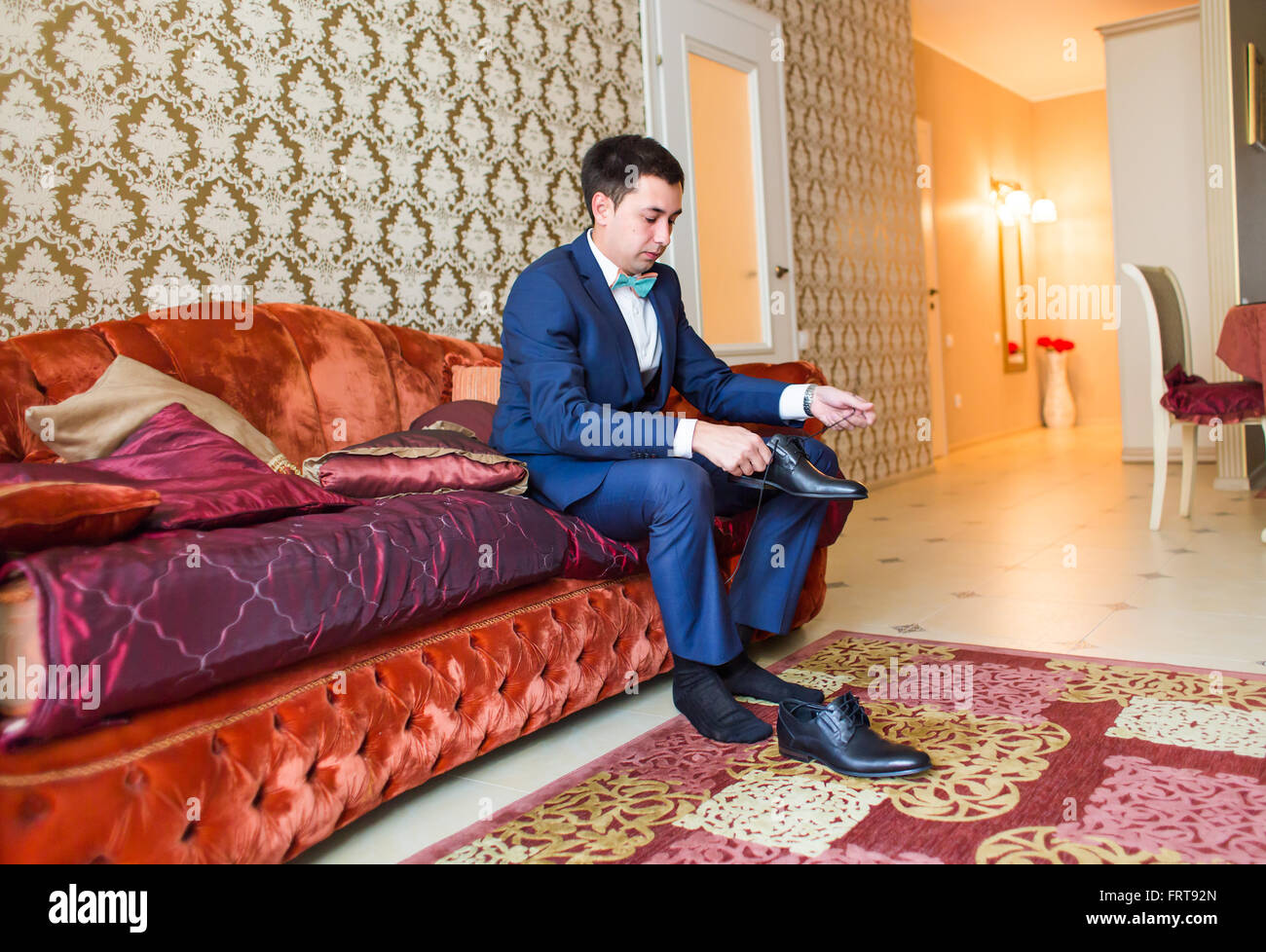 Groom Is Wearing Shoes Indoors Male Portrait Of Handsome Guy