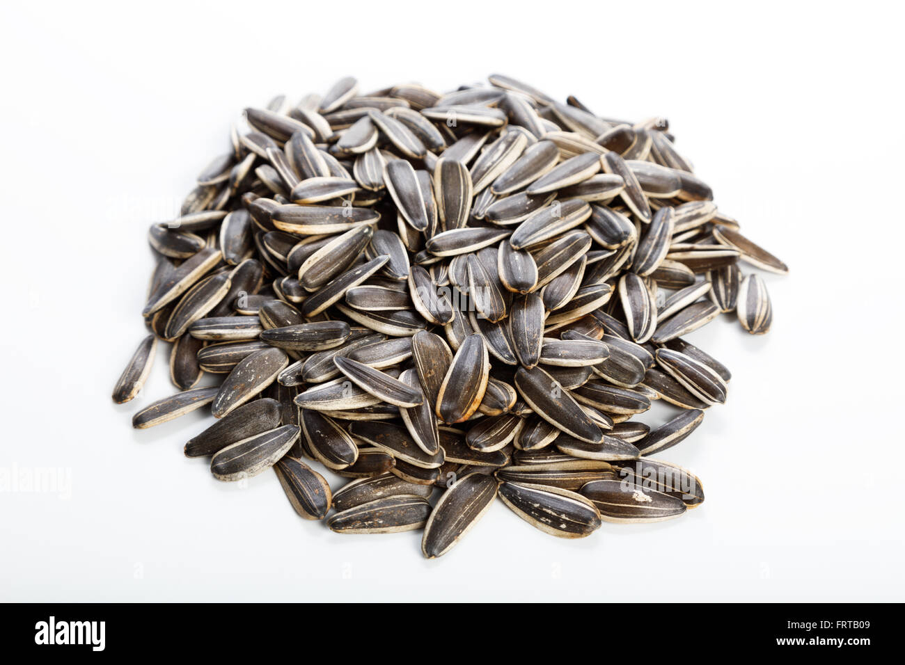 Sunflower seeds, food ingredient with white background. Stock Photo