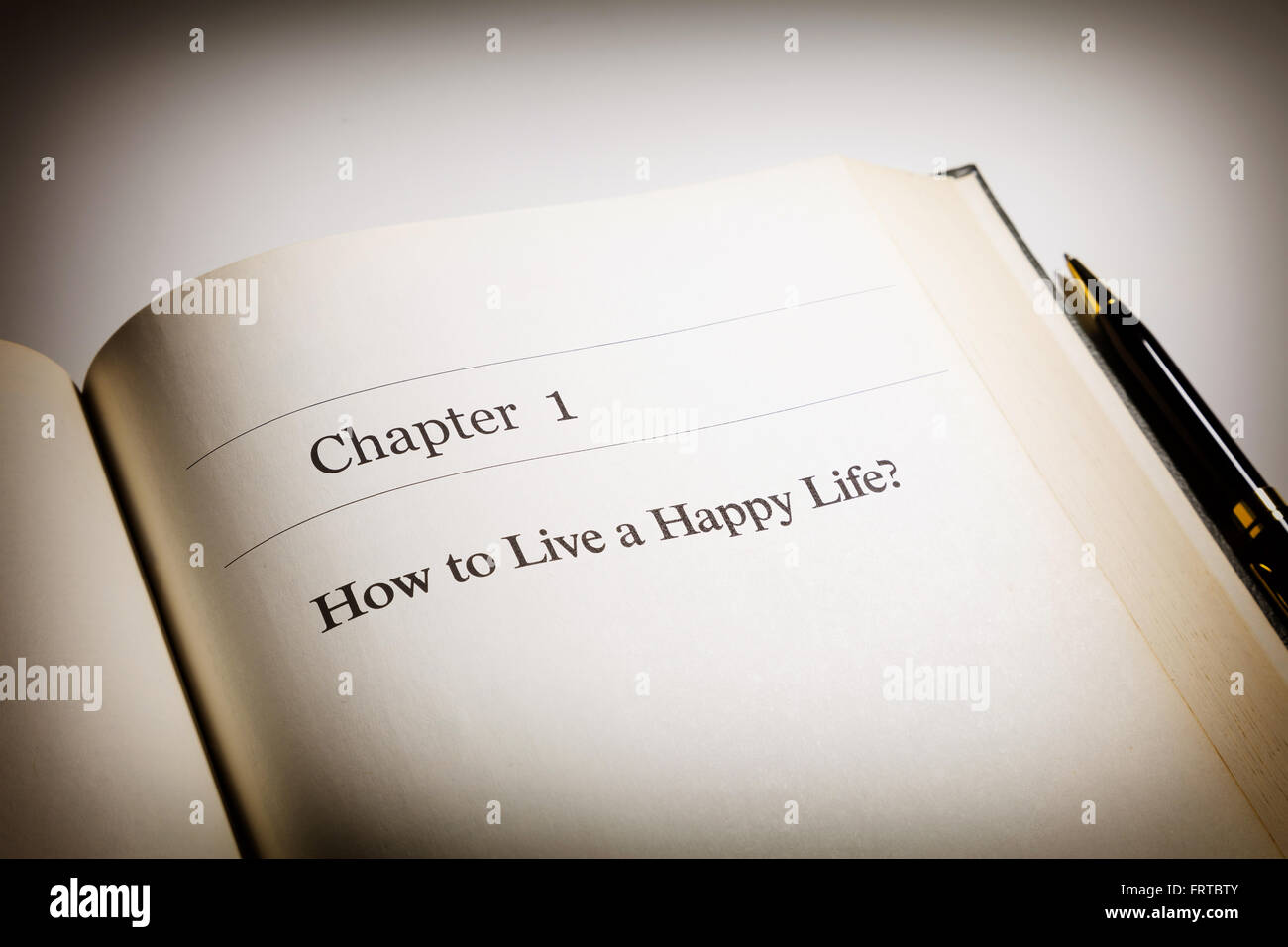 how to live a happy life?  life  philosophy. fake book. Stock Photo