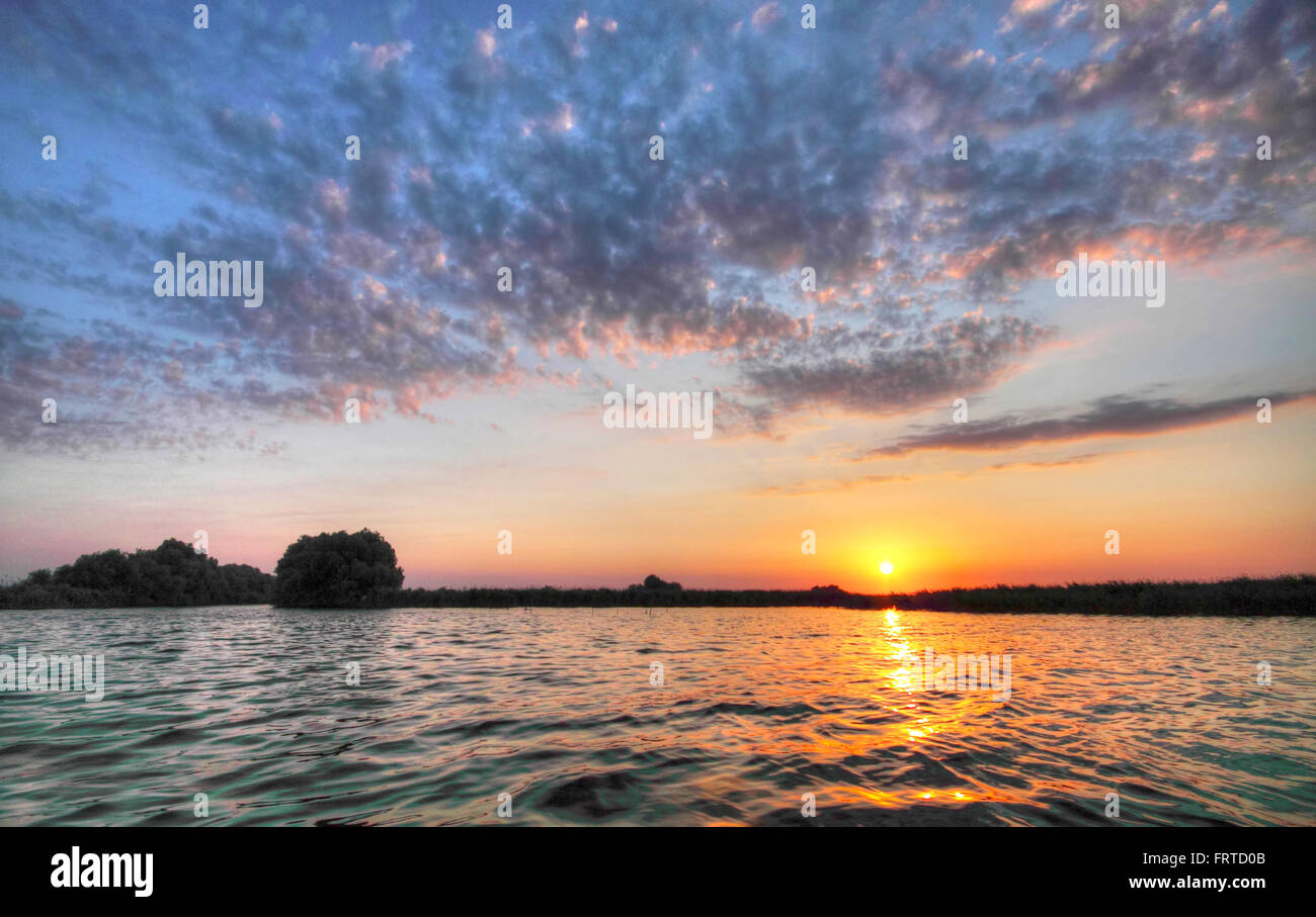 Spectacular sunshine in Danube Delta Romania Stock Photo
