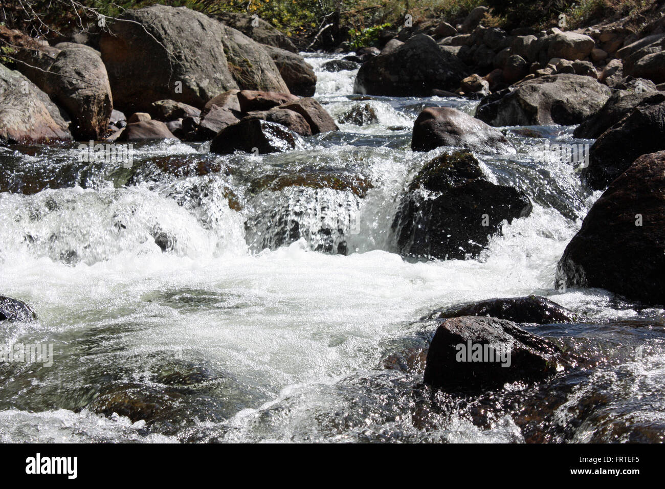 Rushing river in the Colorado Rockies Rocky Mountain National Park ...