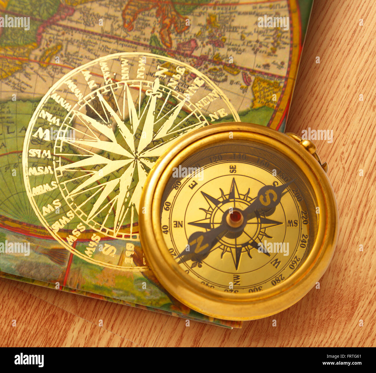 Book compass hi-res stock photography and images - Alamy