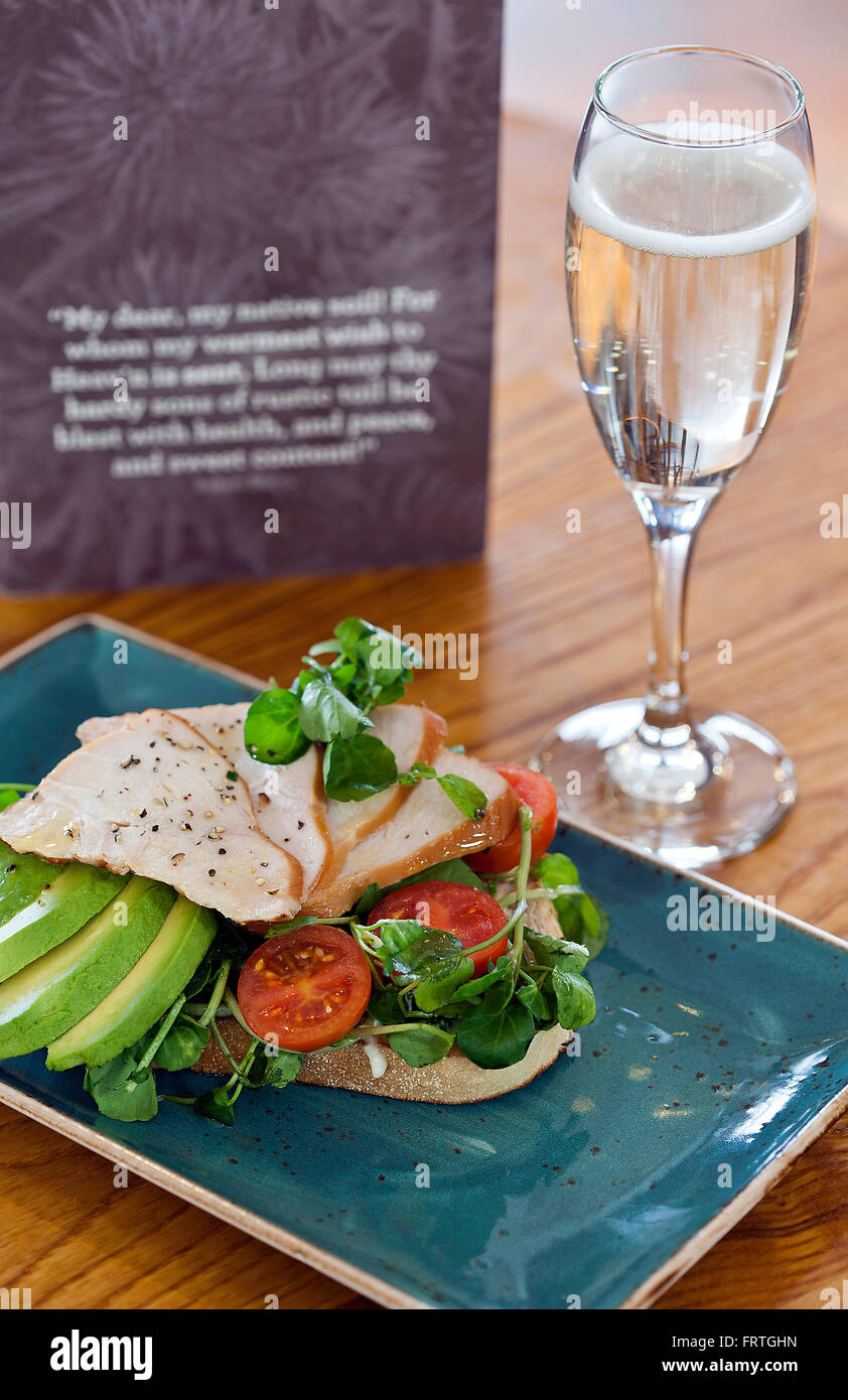 Selective focus image of a chicken salad & prosecco Stock Photo