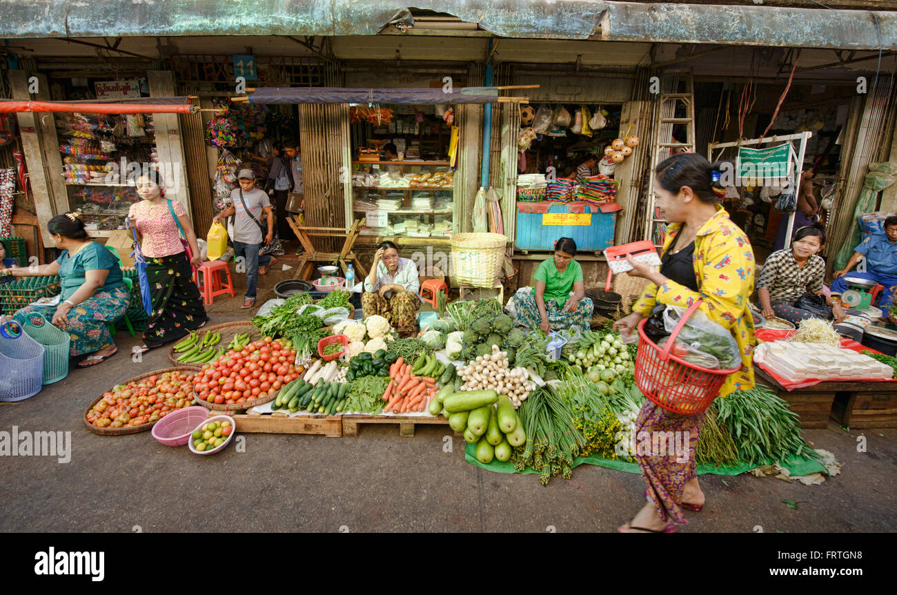 Produce vendors at the Thiri Mingala Market in Yangon, Myanmar Stock