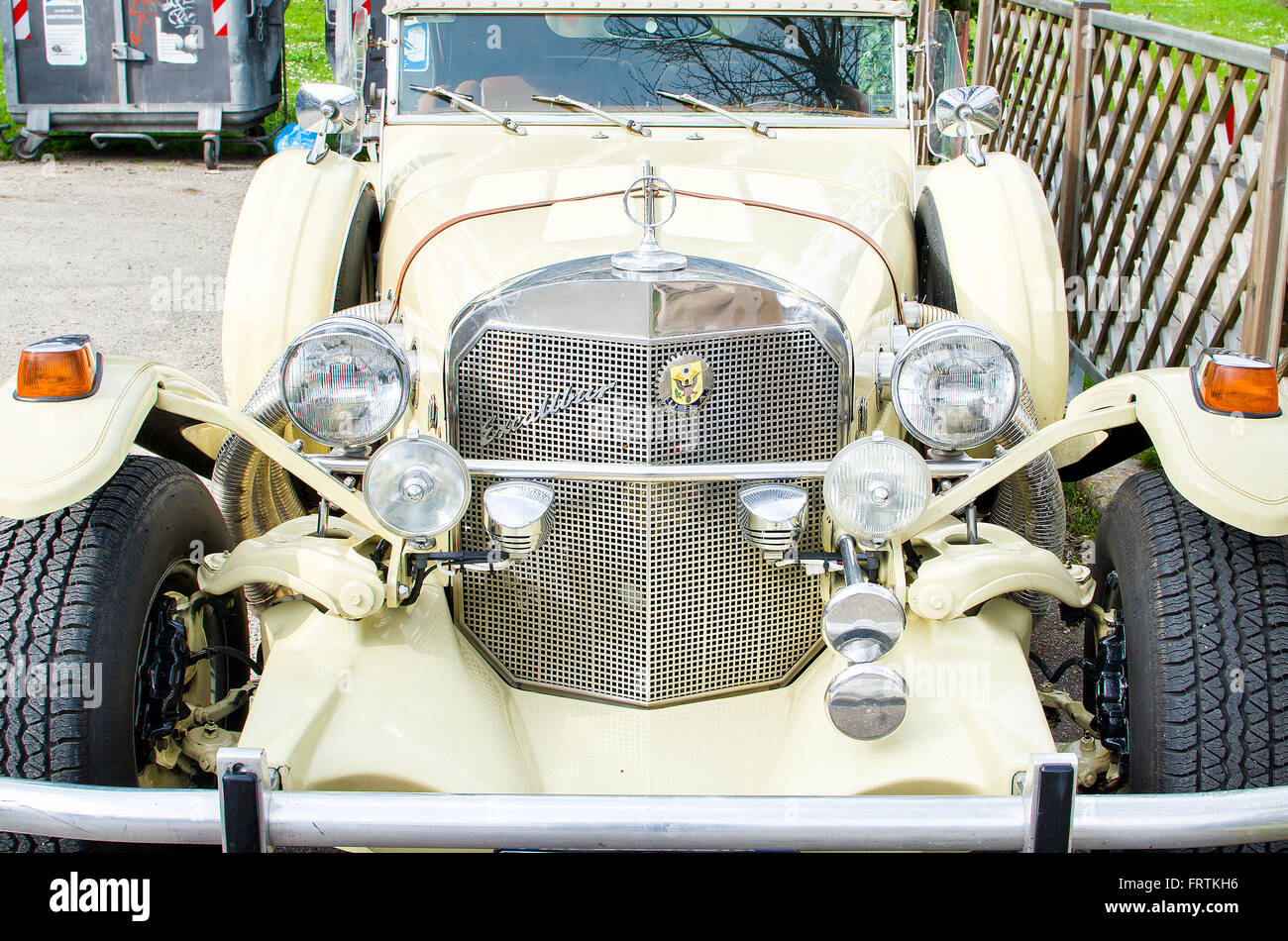 yellow Excalibur vintage car Stock Photo