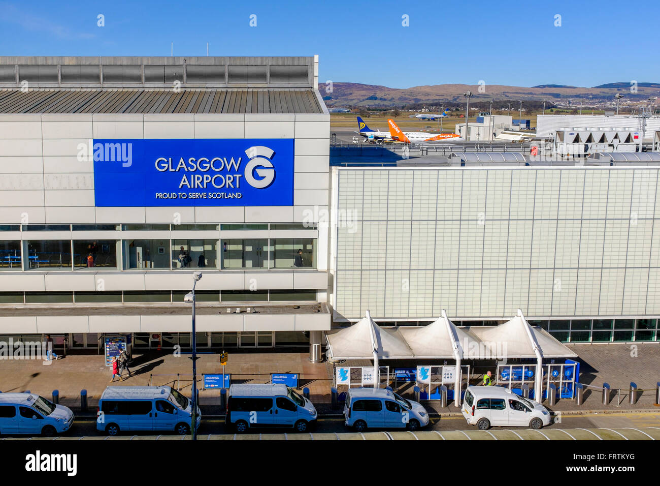 Terminal building of Glasgow Airport, Scotland, UK with taxi rank and
