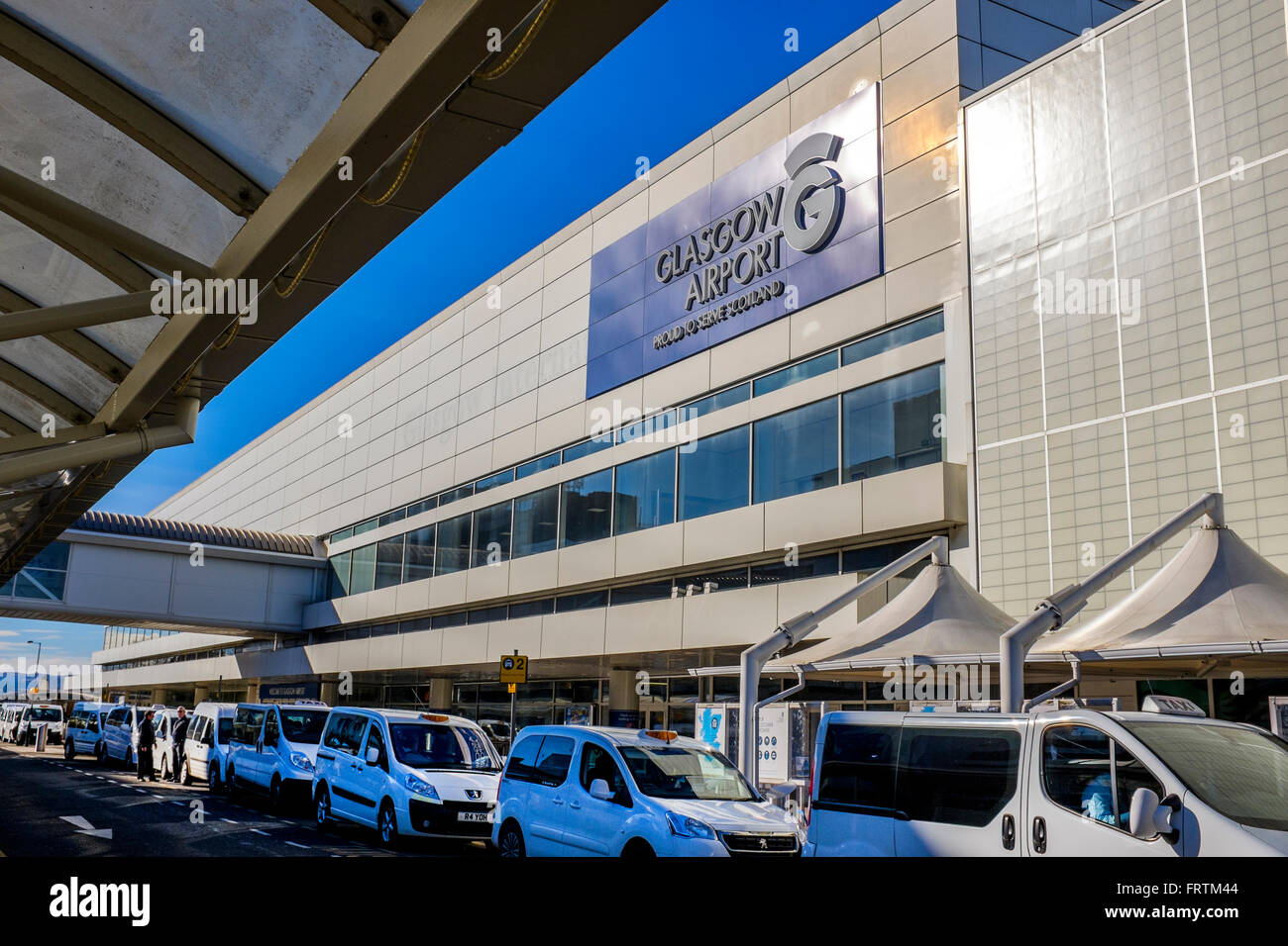 Terminal building of Glasgow Airport, Scotland, UK with taxi rank Stock Photo