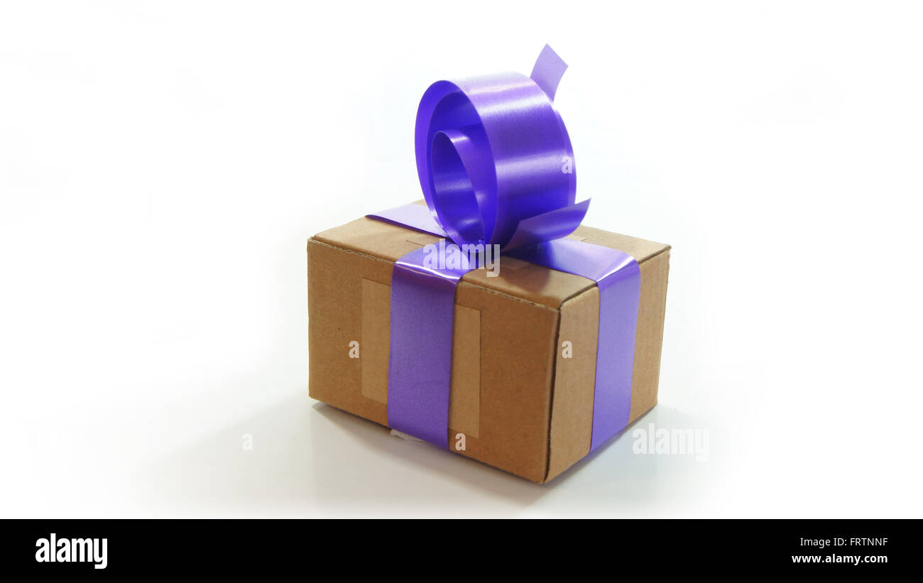 Corrugated cardboard box wrapped with violet ribbon on white background ...