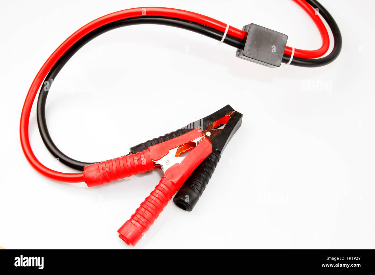 Jumper cables on plain background Stock Photo Alamy
