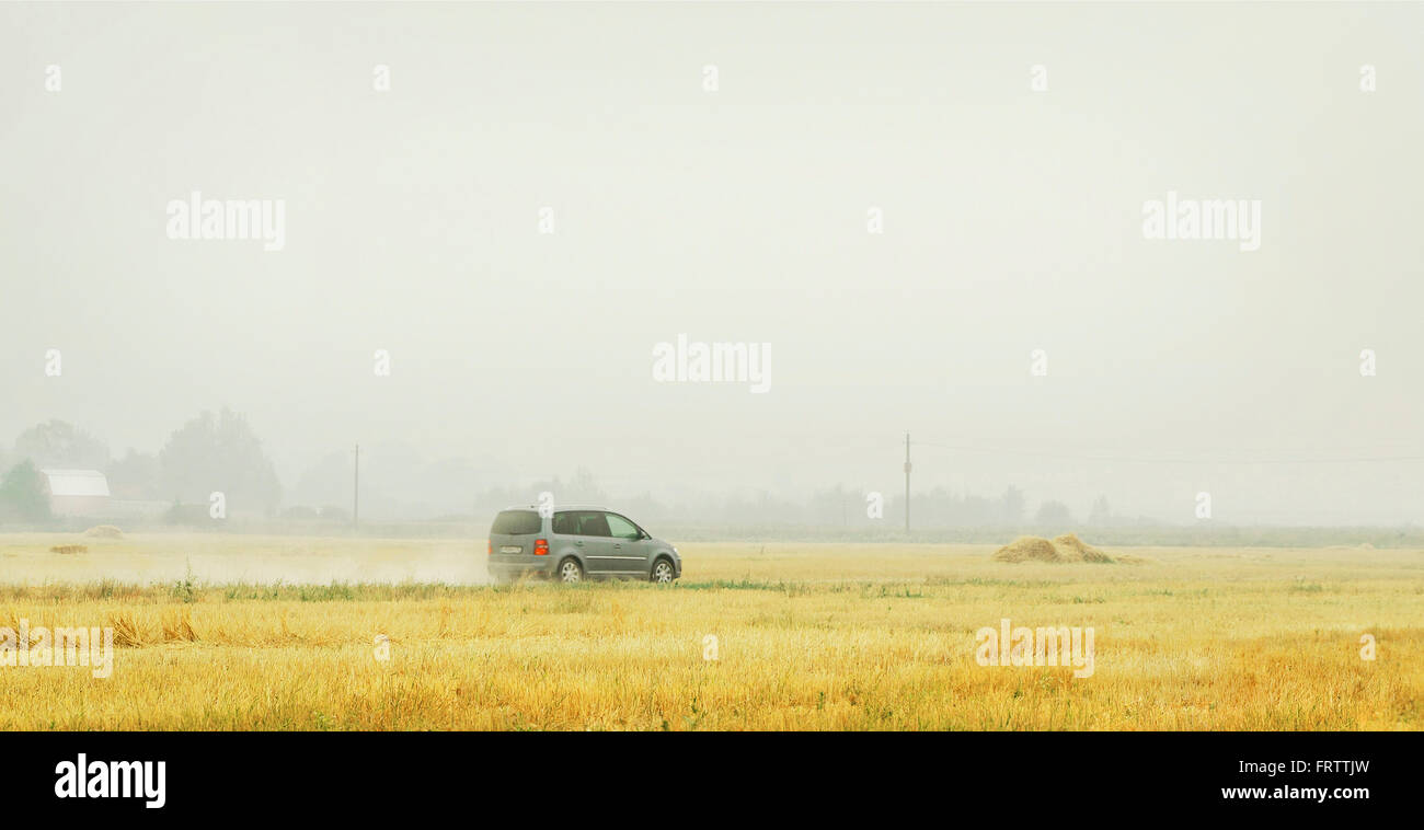 Car in country field hi-res stock photography and images - Alamy