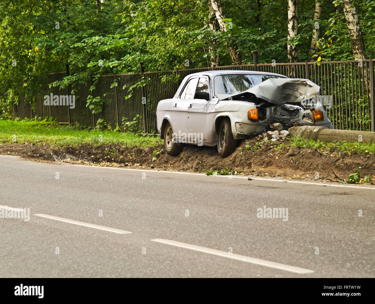 russian retro big sedan tumbled down a column Stock Photo