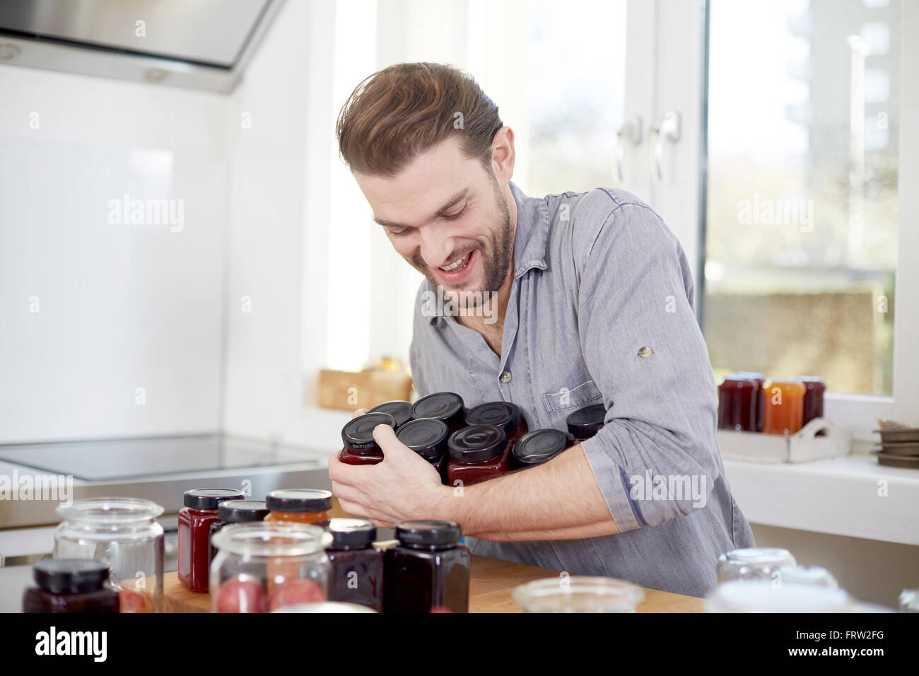 Man carrying jar hires stock photography and images Alamy