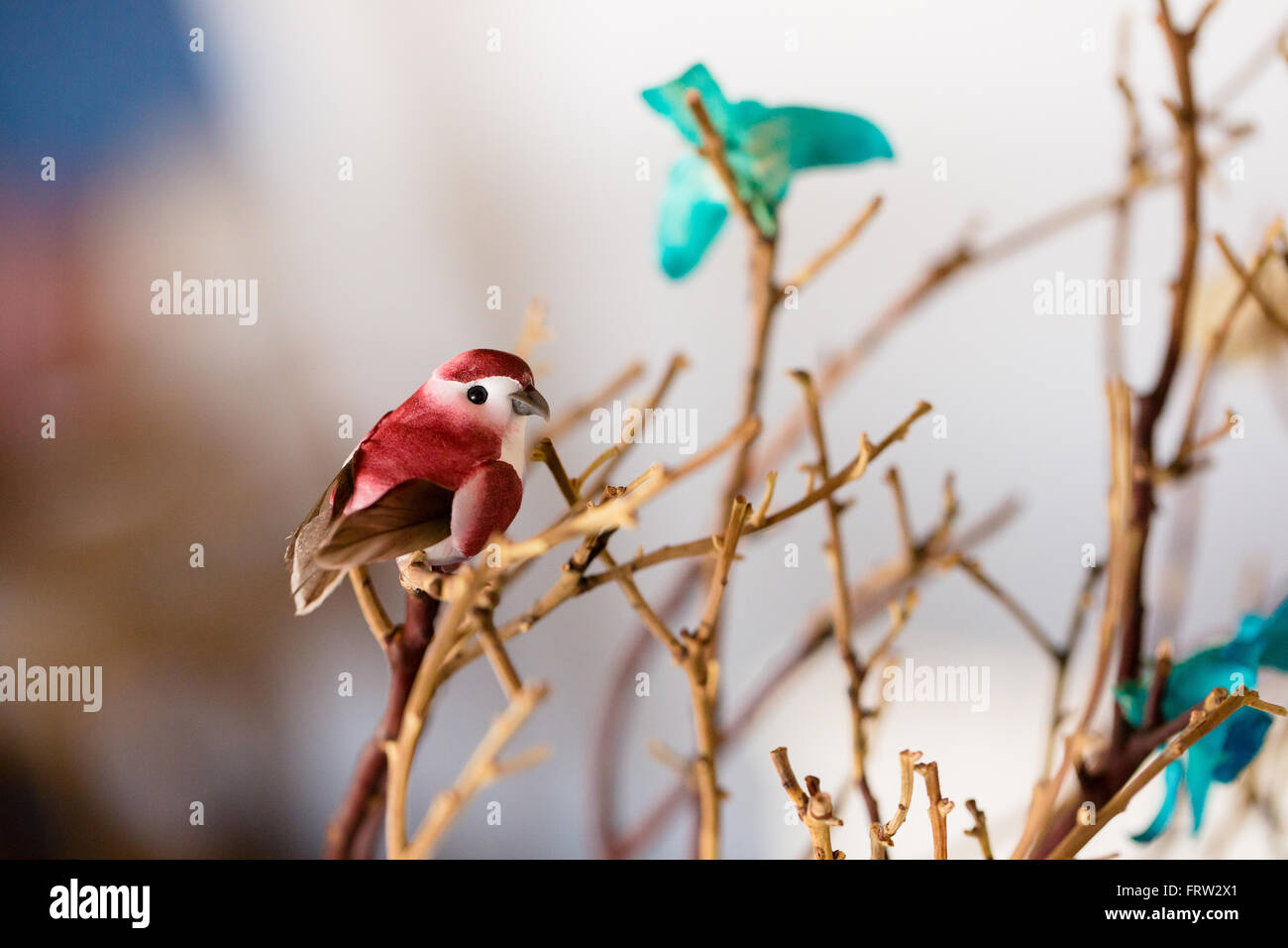 Love bird theme used in the wedding reception decorations features branches and birds. Stock Photo