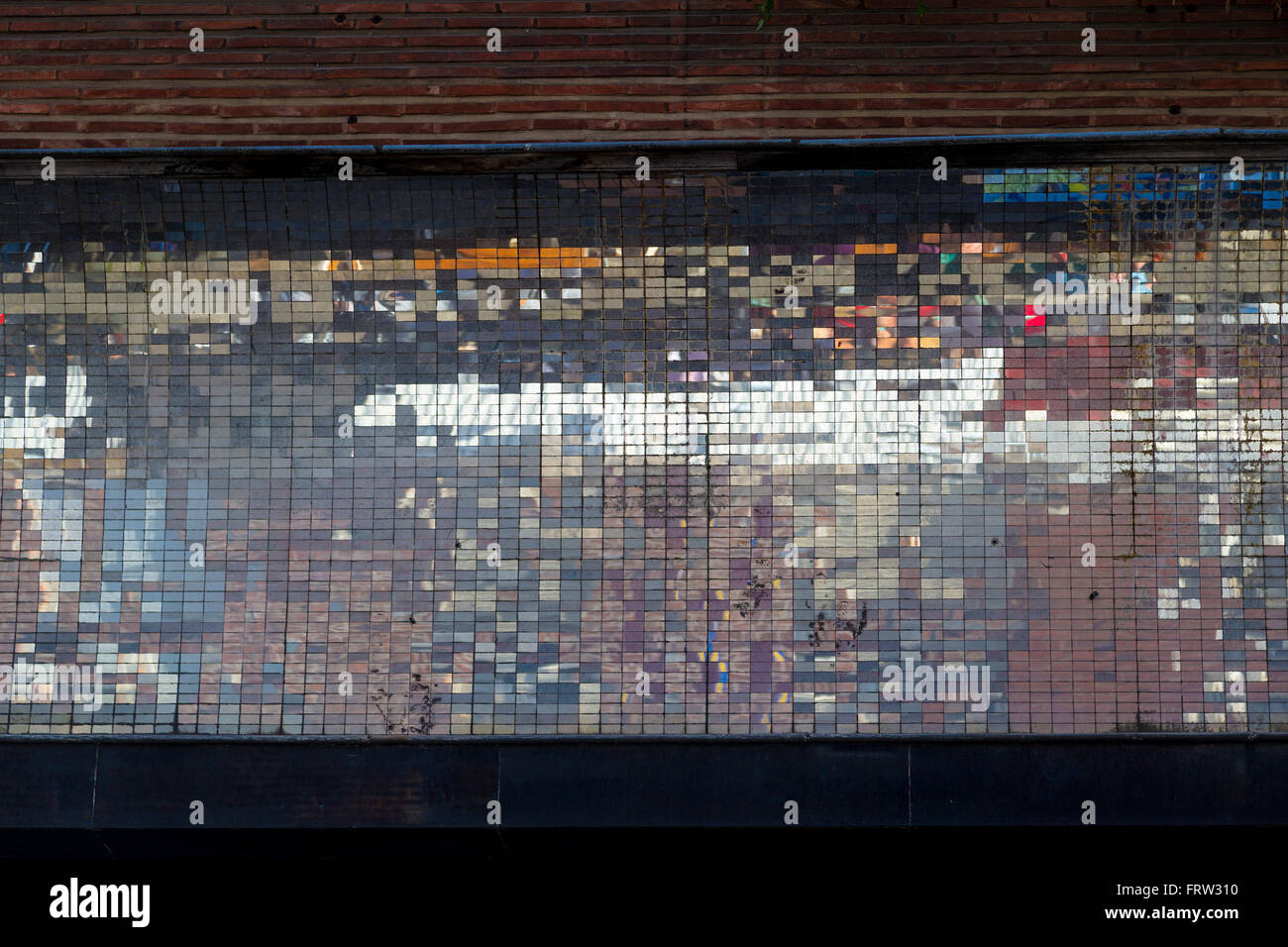 Old abstract colorful square pixel mosaic background on wall structure in Sablon, Brussels Stock Photo