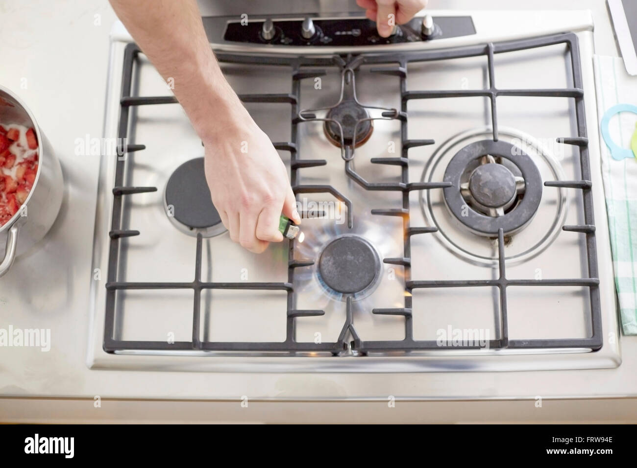 Man lighting gas stove Stock Photo Alamy