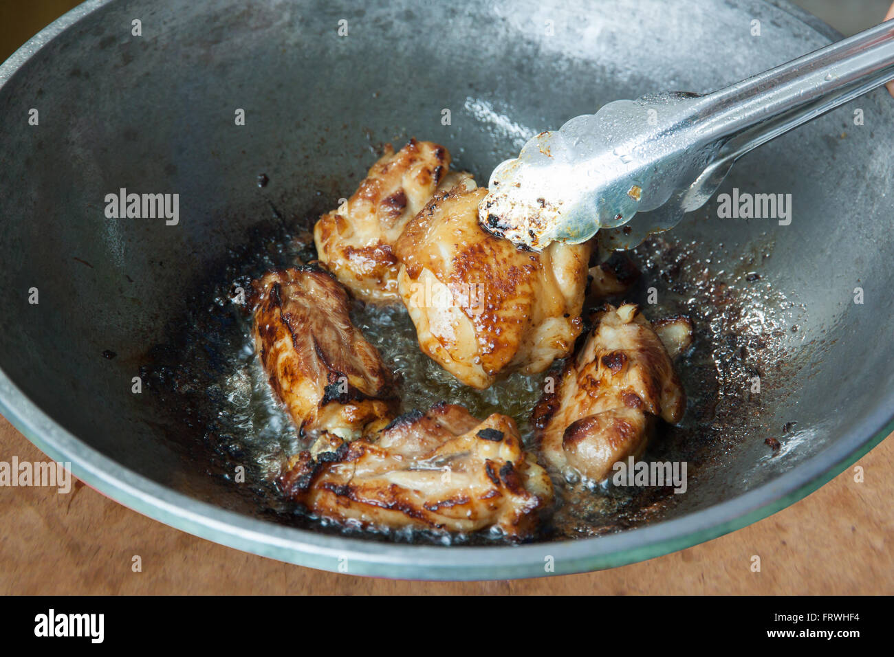 Fried Chicken Cooking in an Iron Skillet Stock Photo Alamy