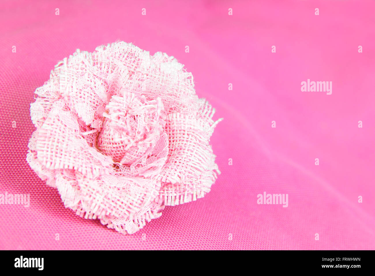 Rose fabrics handcraft on  pink fabric Stock Photo