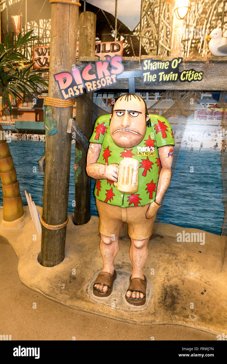 Mannequin in island motif holds beer advertising Dick's Last Resort Restaurant at Mall of America. Bloomington Minnesota MN USA Stock Photo