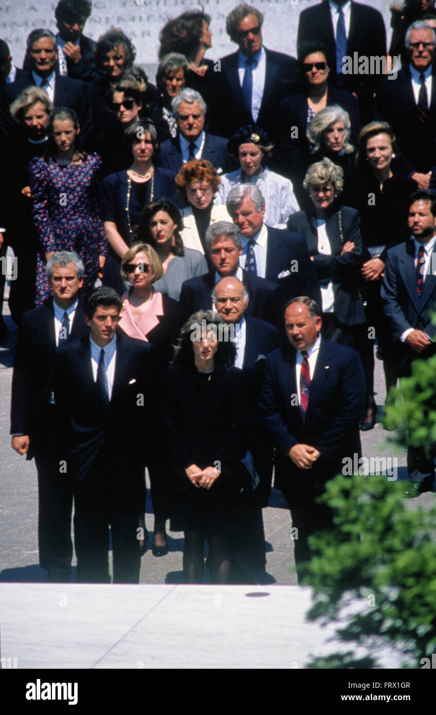 Arlington, Virginia, 23rd May,1994 John F. Kennedy Jr. his sister Caroline Kennedy Schlossberg, President William Clinton and First Lady Hillary Clinton, Senator Robert Kennedy, along with the rest of the Kennedy family attend the burial of Jacqueline Kennedy Onassis. 'Jackie' was laid to rest next to the eternal flame she lighted three decades ago at the grave of her assassinated husband, the 35th President of the United States, John F. Kennedy. Credit: Mark Reinstein Stock Photo
