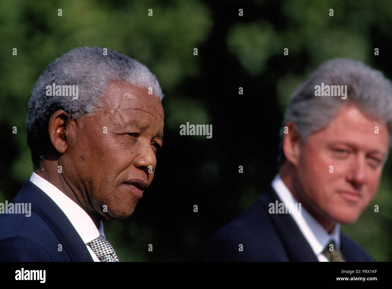 Washington, DC., USA, 5th October, 1994 President William Jefferson Clinton hosts South African President Nelson Mandella at the White House. Mandella was a South African anti-apartheid revolutionary, politician and philanthropist who served as President of South Africa from 1994 to 1999. He was South Africa's first black chief executive, and the first elected in a fully representative democratic election. His government focused on dismantling the legacy of apartheid through tackling institutionalized racism, poverty and inequality, and fostering racial reconciliation.  Credit: Mark Reinstein Stock Photo