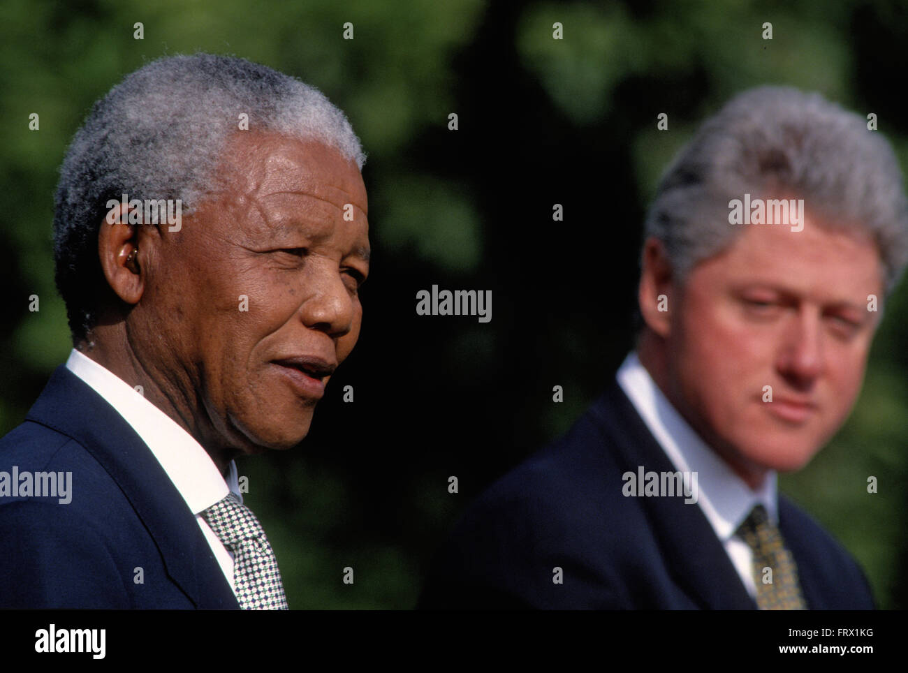 Washington, DC., USA, 5th October, 1994 President William Jefferson Clinton hosts South African President Nelson Mandella at the White House. Mandella was a South African anti-apartheid revolutionary, politician and philanthropist who served as President of South Africa from 1994 to 1999. He was South Africa's first black chief executive, and the first elected in a fully representative democratic election. His government focused on dismantling the legacy of apartheid through tackling institutionalized racism, poverty and inequality, and fostering racial reconciliation. Credit: Mark Reinstein Stock Photo
