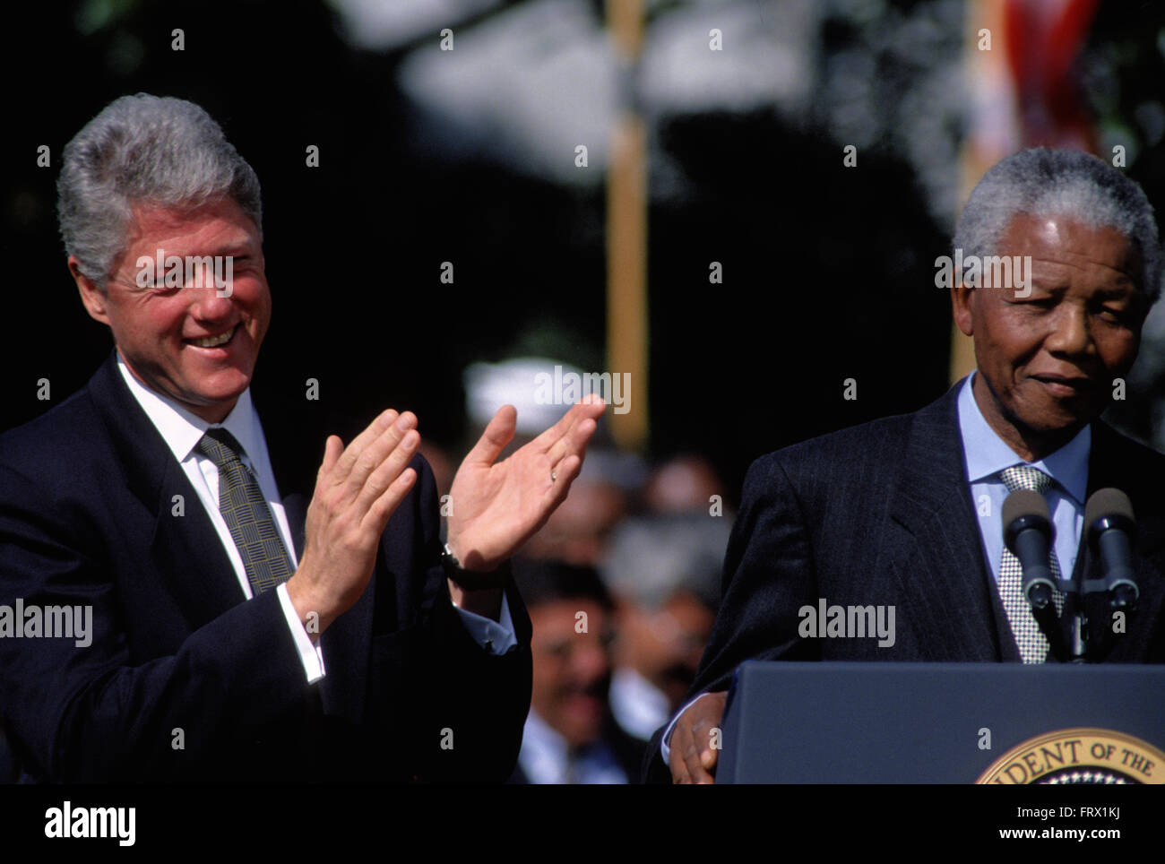 Washington, DC., USA, 5th October, 1994 President William Jefferson Clinton hosts South African President Nelson Mandella at the White House. Mandella was a South African anti-apartheid revolutionary, politician and philanthropist who served as President of South Africa from 1994 to 1999. He was South Africa's first black chief executive, and the first elected in a fully representative democratic election. His government focused on dismantling the legacy of apartheid through tackling institutionalized racism, poverty and inequality, and fostering racial reconciliation. Credit: Mark Reinstein Stock Photo