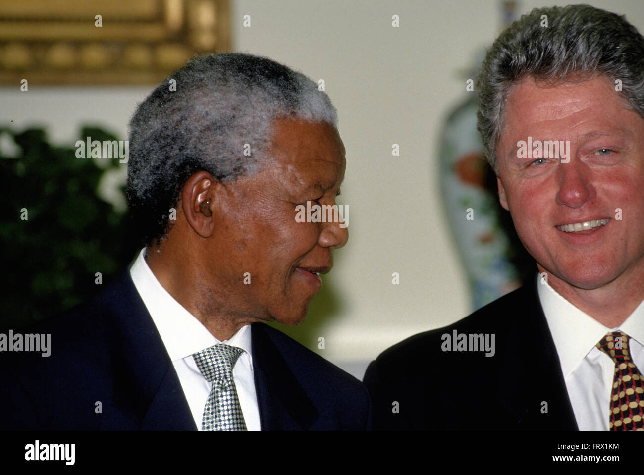Washington, DC., USA, 5th October, 1994 President William Jefferson Clinton hosts South African President Nelson Mandella at the White House. Mandella was a South African anti apartheid revolutionary, politician and philanthropist who served as President of South Africa from 1994 to 1999. He was South Africa's first black chief executive, and the first elected in a fully representative democratic election. His government focused on dismantling the legacy of apartheid through tackling institutionalized racism, poverty and inequality, and fostering racial reconciliation.  Credit: Mark Reinstein Stock Photo