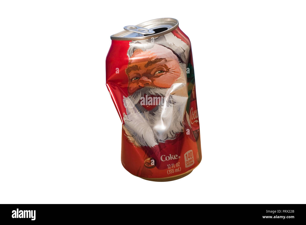 Cut Out. Santa Claus on an empty crushed and dented 12oz can of Coca-Cola isolated on white background Stock Photo